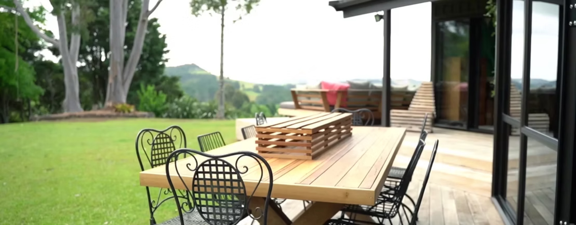 Picture of wooden outdoor table in a backyard
